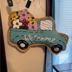 Vintage truck door hanger bought from a local boutique.